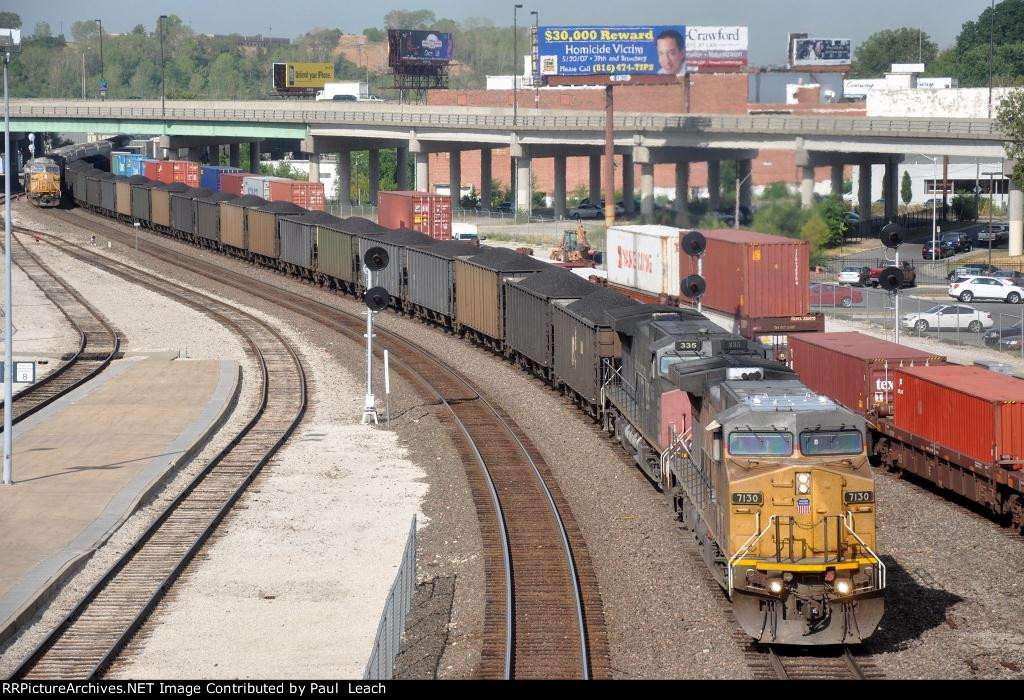 Coal loads roll east past the station